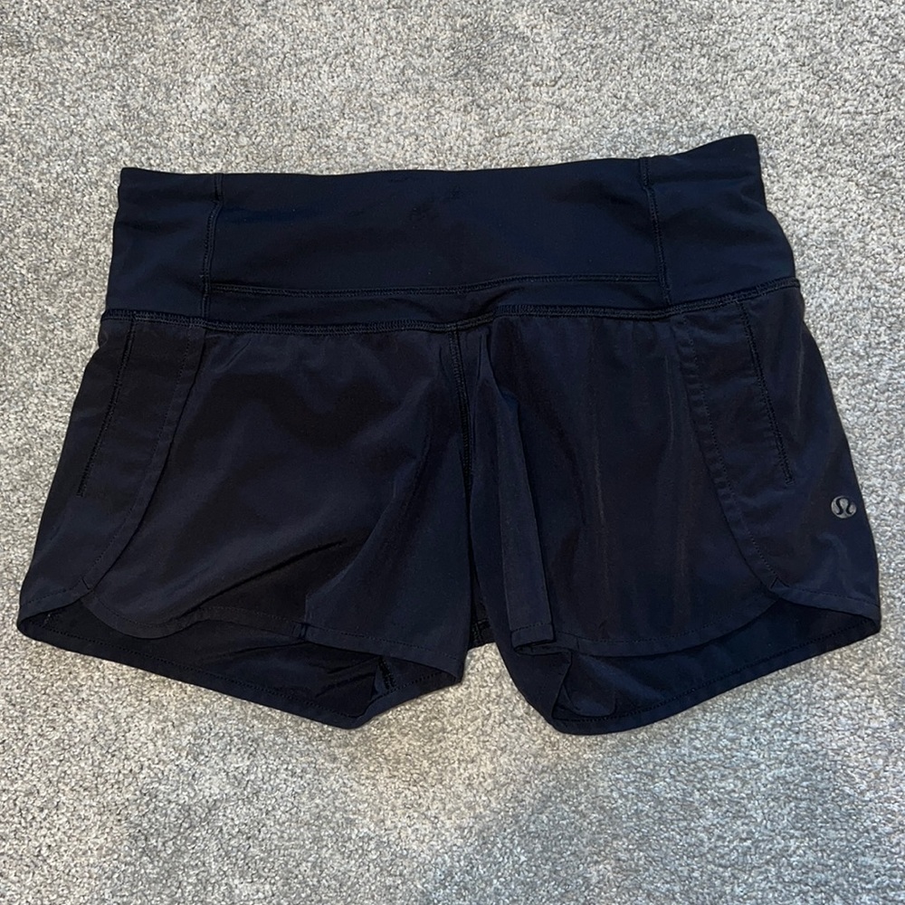Lululemon “Tracker low rise lined shorts (4”)” in black. Gently worn.